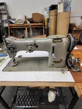 Pfaff 138 industrial zig-zag sewing machine- complete with table and accessories